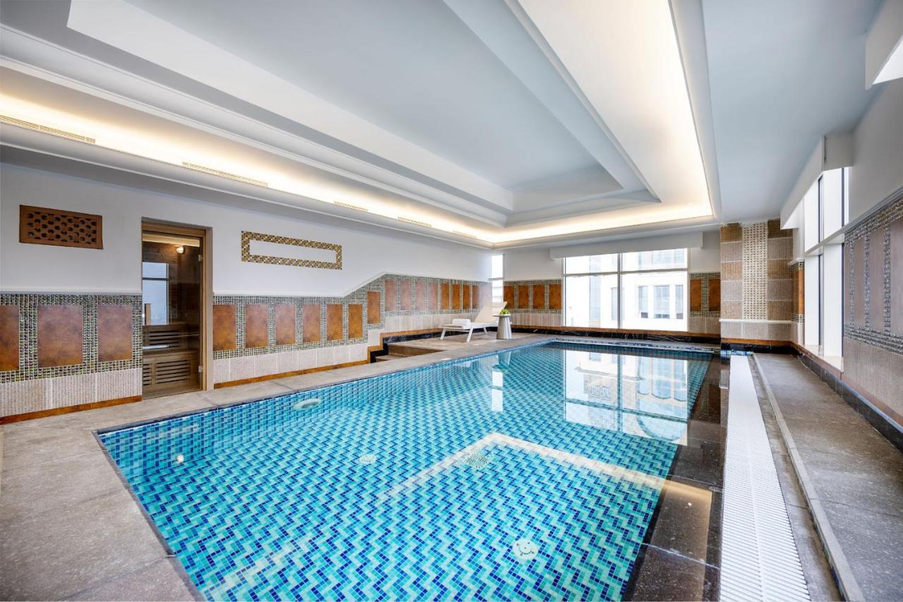 Dusit Hotel & Suites - Доха Экстерьер фото Indoor pool